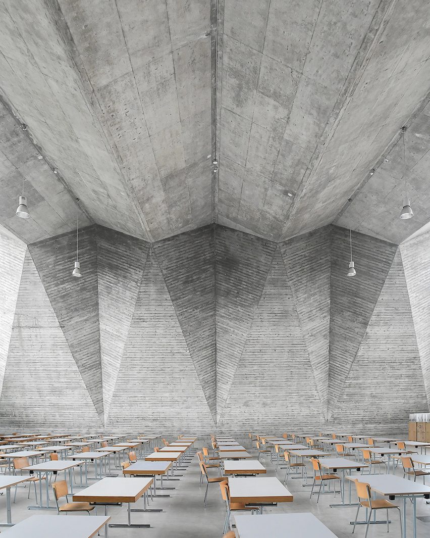 Brutalist interior of the Maurerhalle lecture theatre in Basel, Switzerland