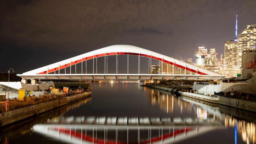 White bridge with Toronto in the background at night