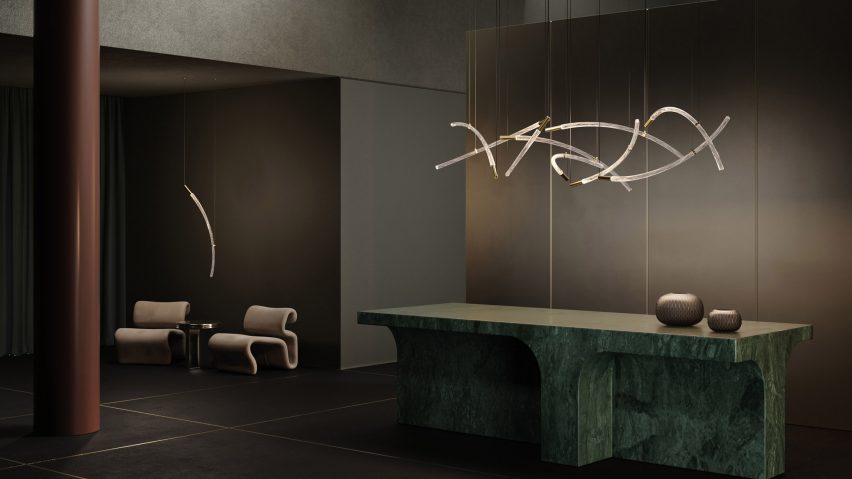 Bomma Flare pendant lighting fixture hanging over a table