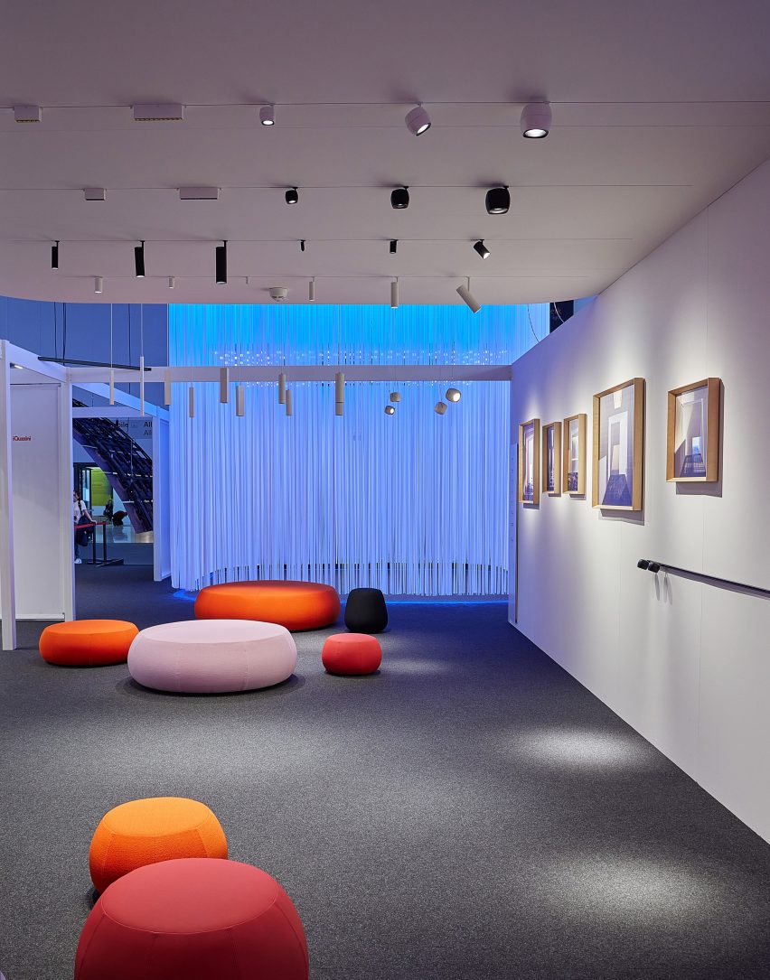 iGuzzini's stall at the Light + Building fair features a showcase of their spotlights and pendant lights
