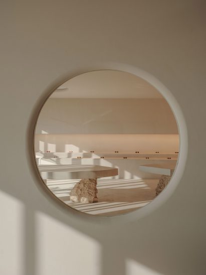 Look at eyewear showroom through circular window