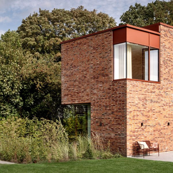 Valbæk Brørup Architects completes “simple and calm” brick villa outside Copenhagen