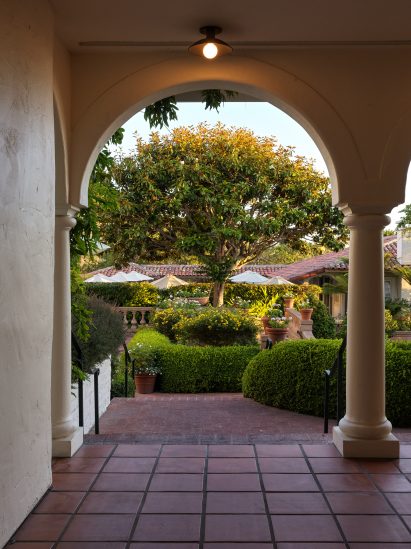 Arched colonnade overlooking landscaped garden