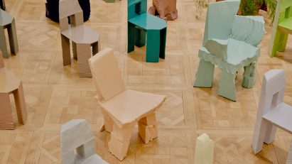 Max Lamb colourful furniture on parquet wooden floor
