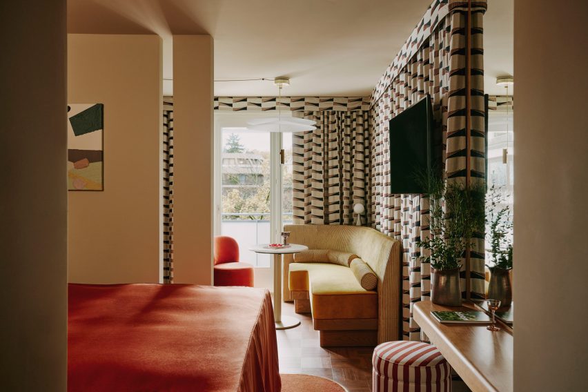 Apartment suite with bed and living area Locke hotel Zurich