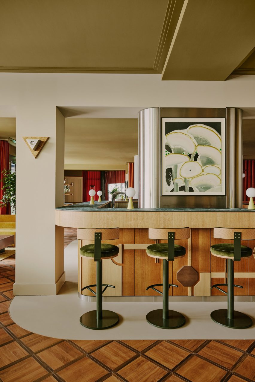 Wood-lined bar area with parquet floor downstairs in Locke Zurich