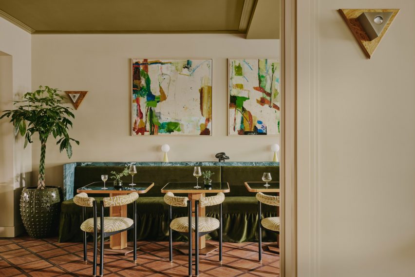 Choupette restaurant with metal wall lights inside Locke am Platz hotel Zurich