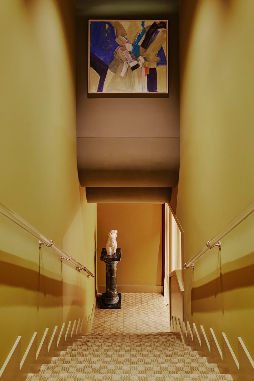 Yellow toned staircase in hotel Locke Zurich