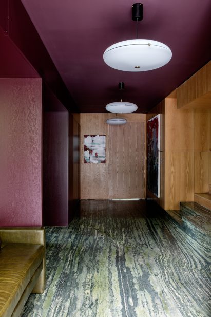 Oak-lined hallway with colourful accents