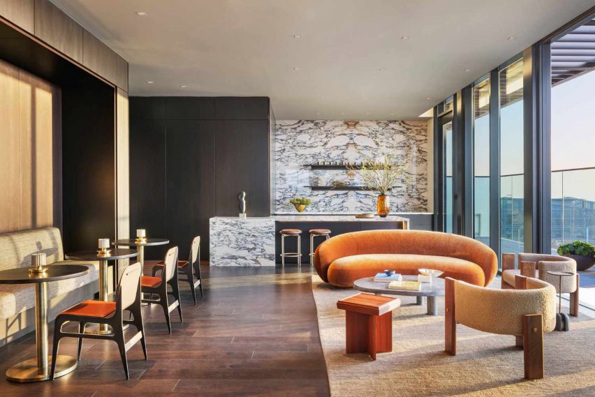 A room with an orange couche