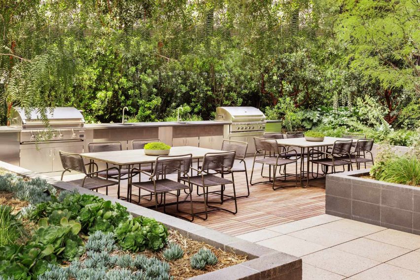 A courtyard with tables and chairs