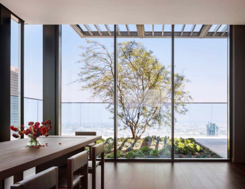 A terrace with tree and bushes