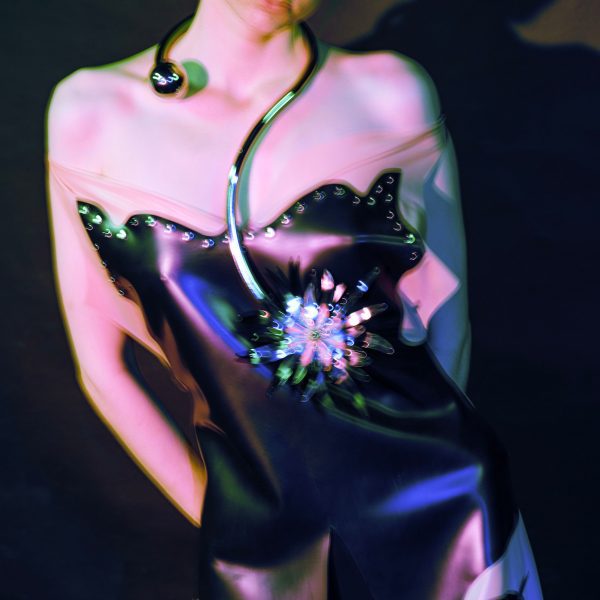 Modern dress design featuring a flower