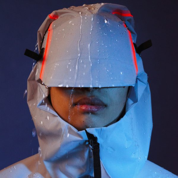 Head of person covered with clothes on the upper half