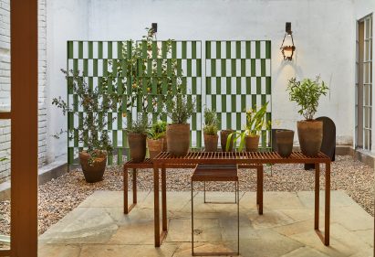 A patio area with green metal screen