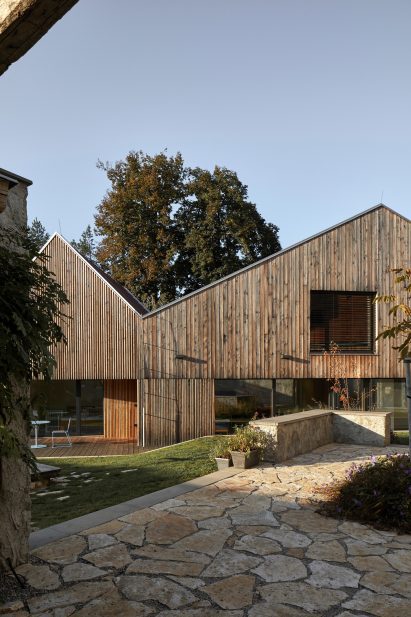Patio overlooking wooden home