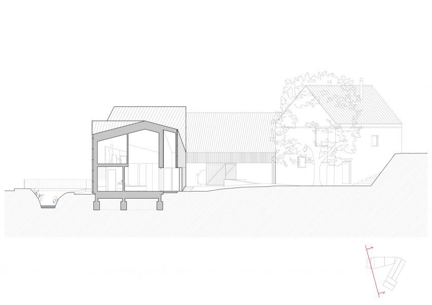 Section of New House with Old Mill by RDTH Architekti