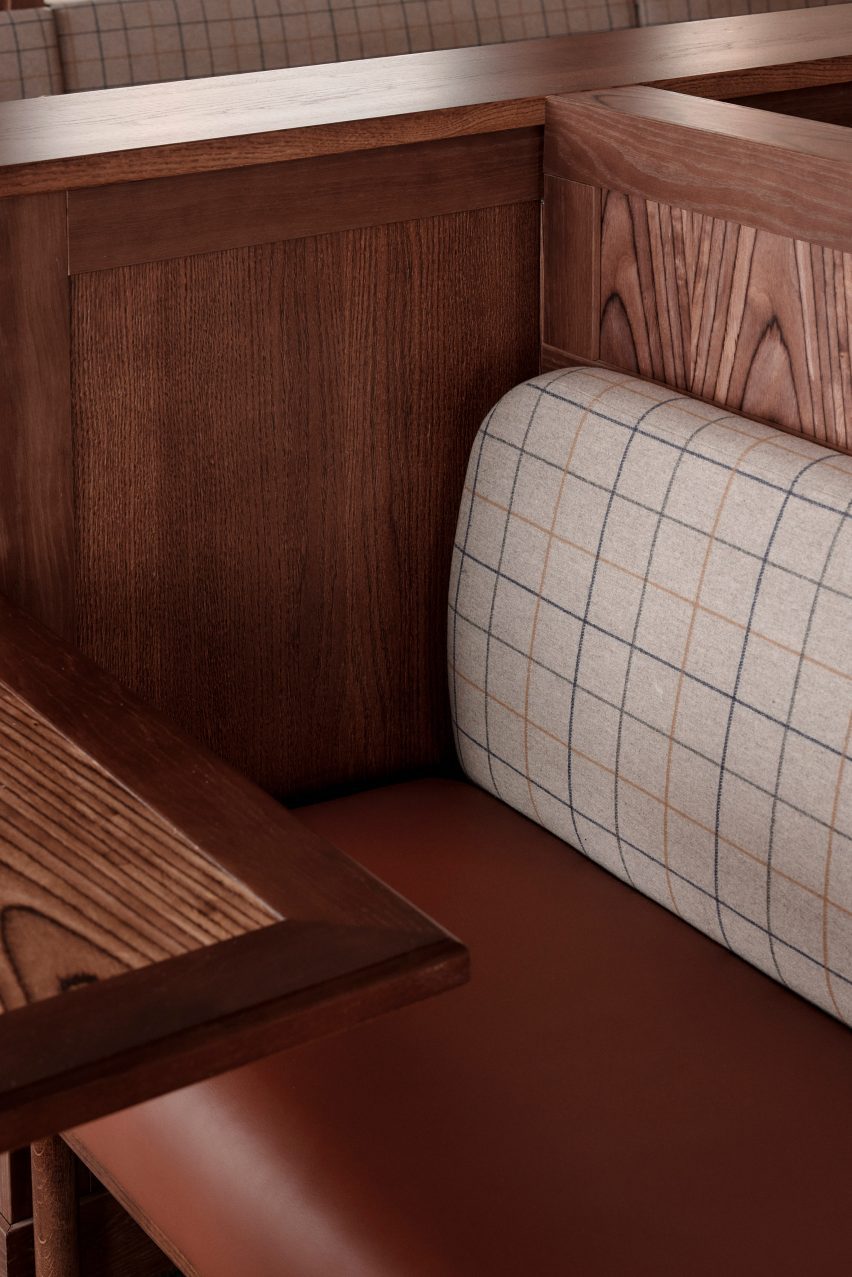 Banquette with leather seat and chequered wool textile upholstery