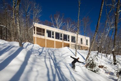 Cedar-clad residence on stilts