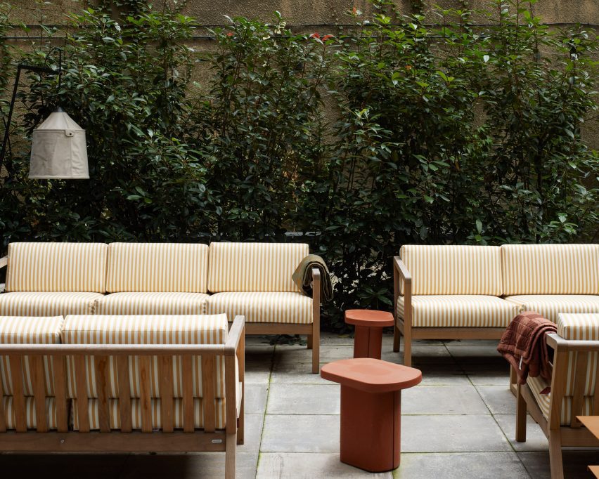 Courtyard with sofas in Roca living in Liverpool by SODA
