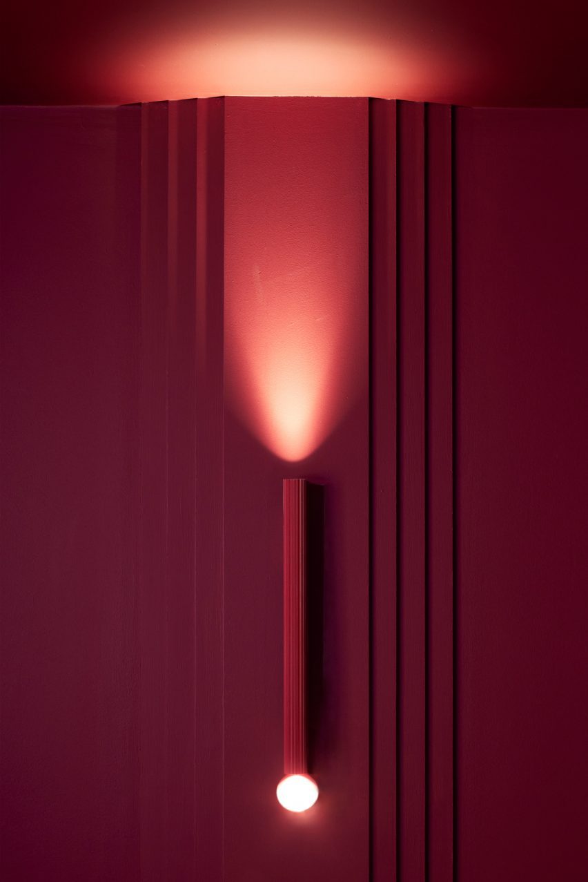 Wall light in red cinema room