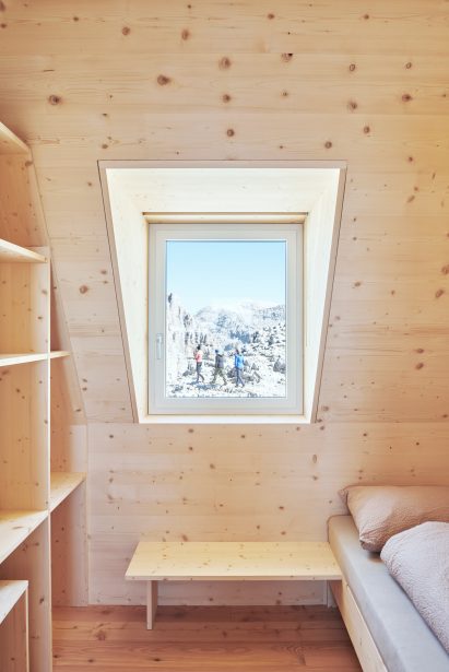 Wooden bedroom interior at The Shelter Santnerpass