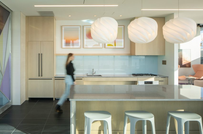 Person walking in kitchen