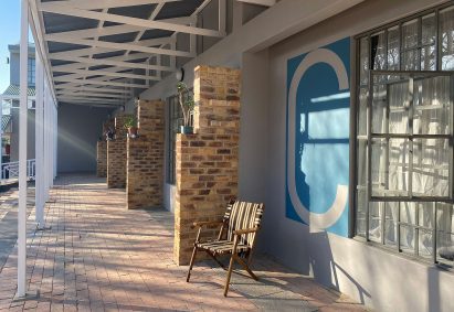 Patios and brick fins in Slava Village Boksburg Lofts by Savage + Dodd in South Africa