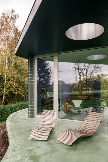 Extension on a green concrete platform