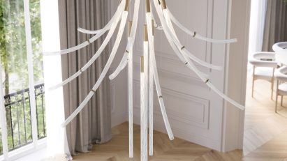 Bomma's flare light fixture hanging above a coffee table