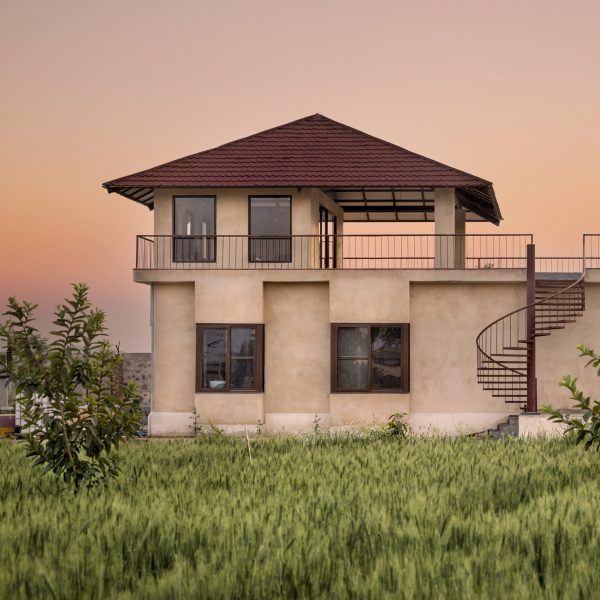 Exterior of Stone House by Sketch Design Studio