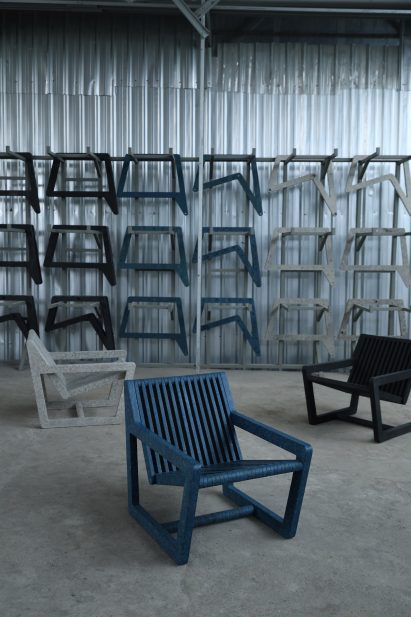 White, blue and black Ombak chairs with armrests by Sungai Design