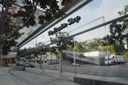 Exterior of a building on Sunset Boulevard covered in reflective film