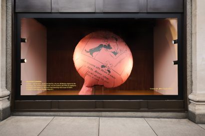 A giant whoopee cushion in a department store window