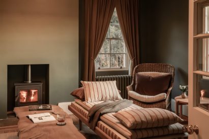 Seating area inside holiday home by Wildland and Ruth Kramer
