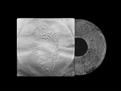 Shiny silver vinyl record and sleeve