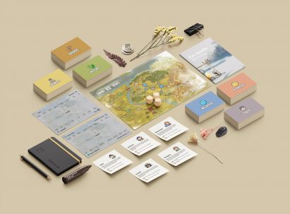 Components of a board game set out on a table
