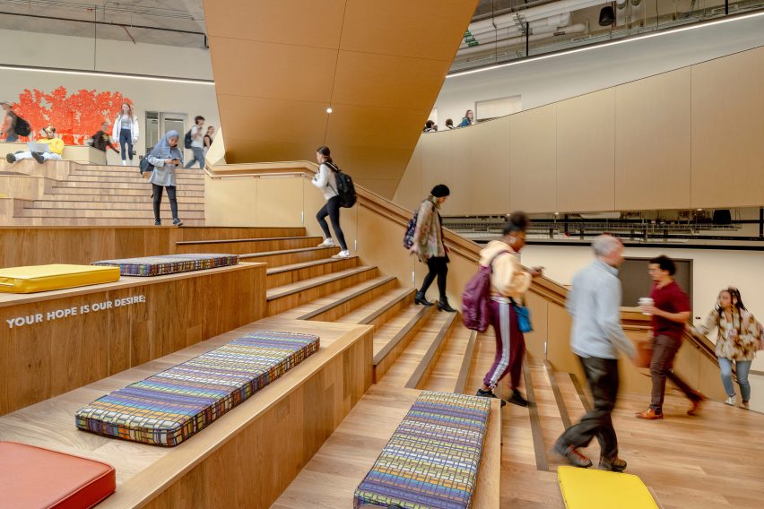 Students walking up and down benches