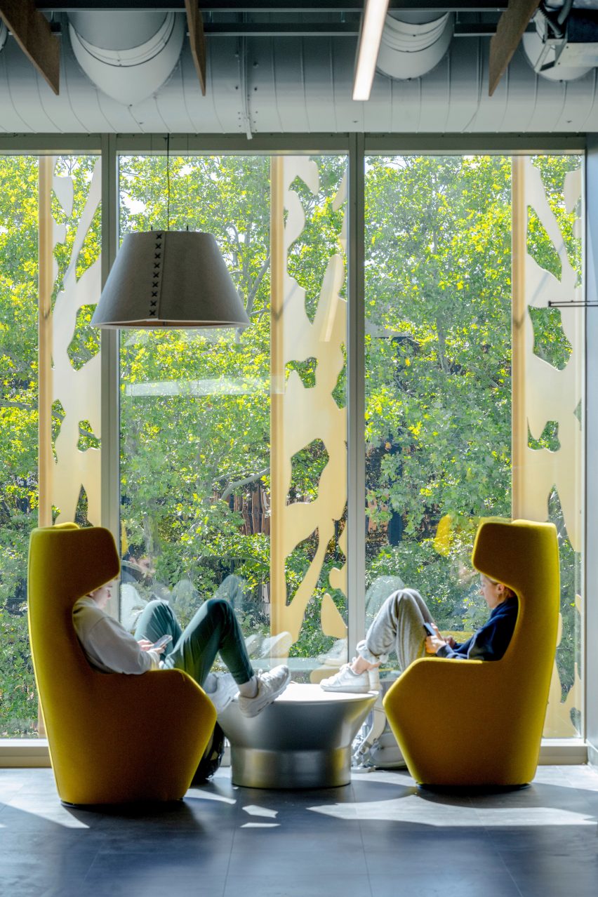 Kids sitting in front of window