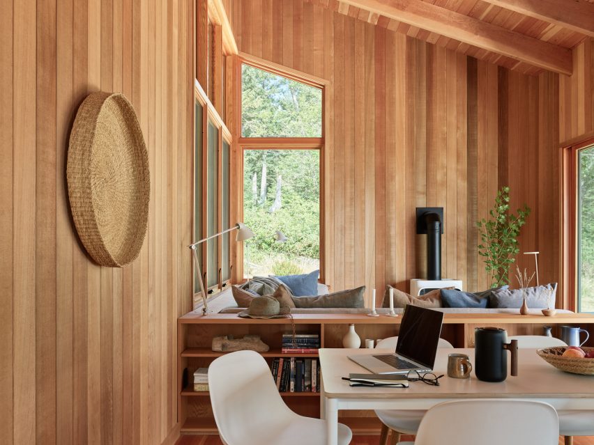 A dining table placed next to a seating area
