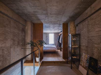 First floor landing within narrow house by IGArchitects