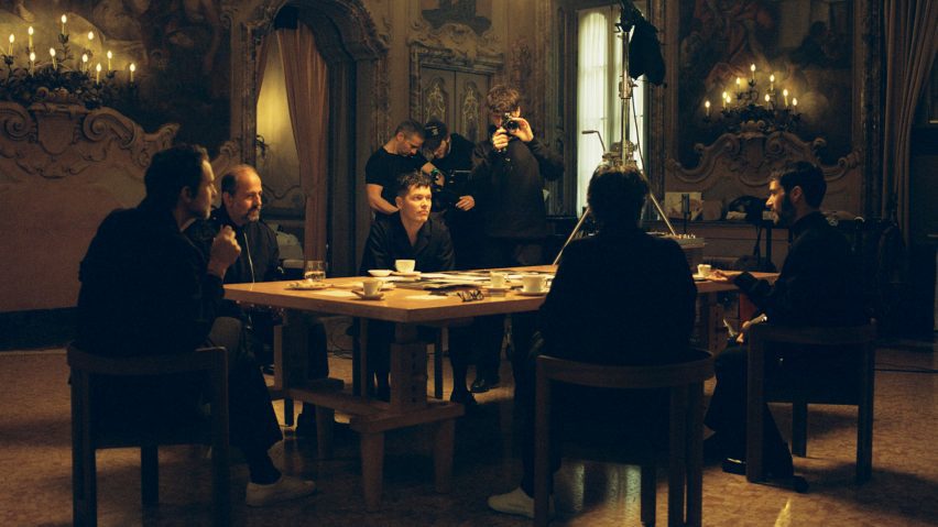 Photo of people sat at a table