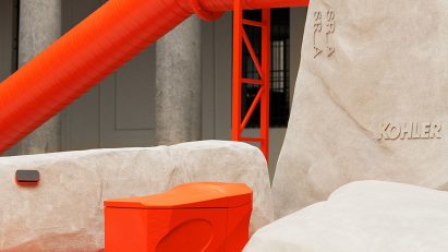Orange pipes, orange toilet and concrete