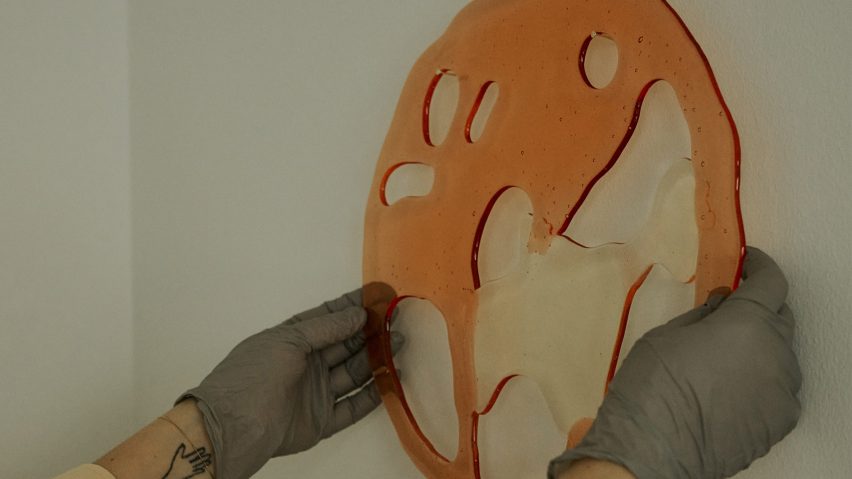 Photo of person holding a design object