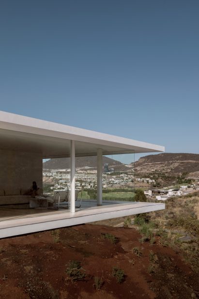 The corner of a house over a ledge