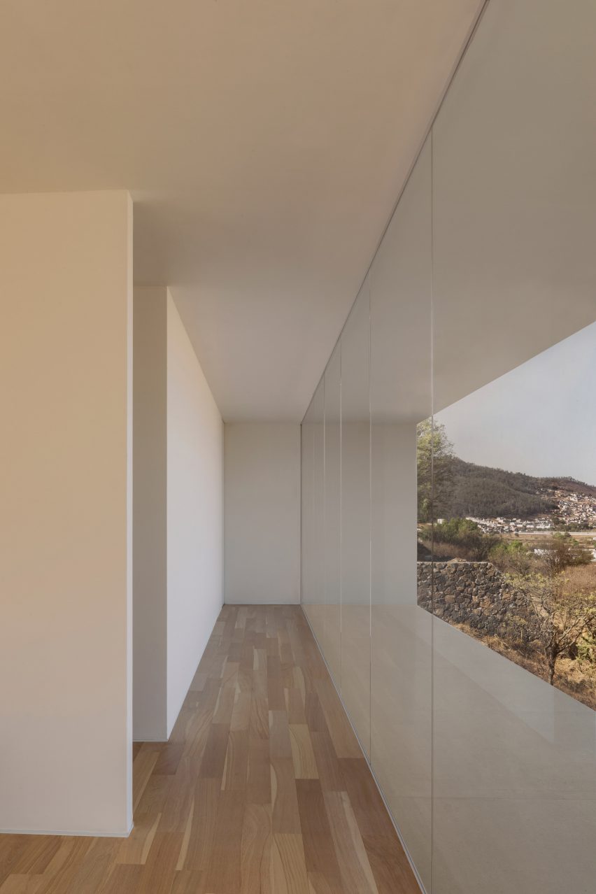 Hallway with windows on either side