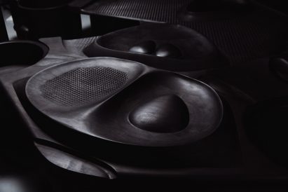 Close-up of wooden table with carved surface
