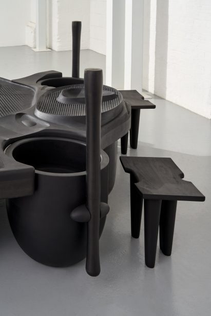 Close-up of workstation with large pestle and mortar