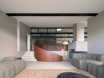 Living area within Curvilinear Serenity home in Iceland