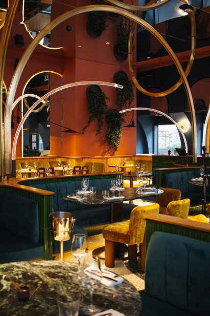 teal seating booths at restaurant